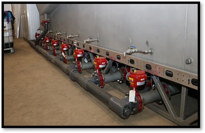 Fabricated steel manifold and valve assembly for a Soneera treatment unit